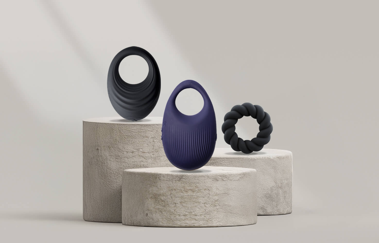 Collection of C-Rings on a stone podium
