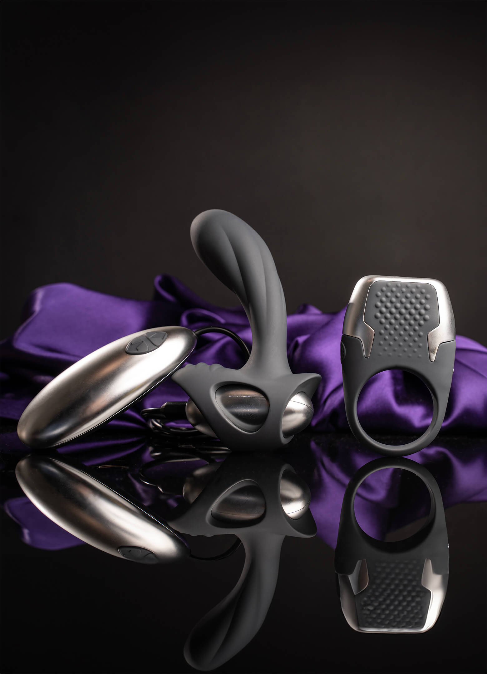 Grey prostate and perineum vibrator, and cock ring set.