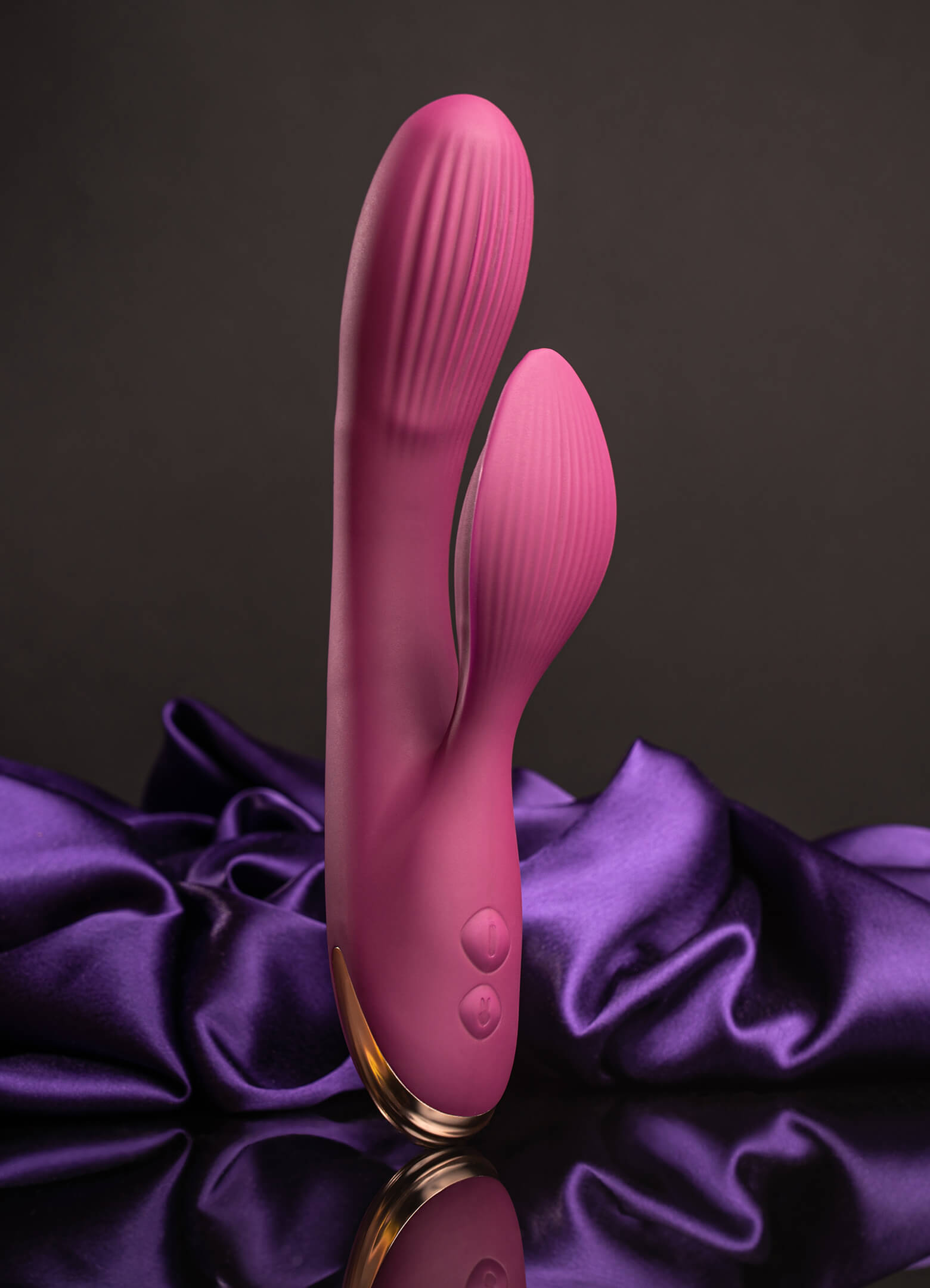 Burgundy rabbit vibrator with ribbed head and petal ears.