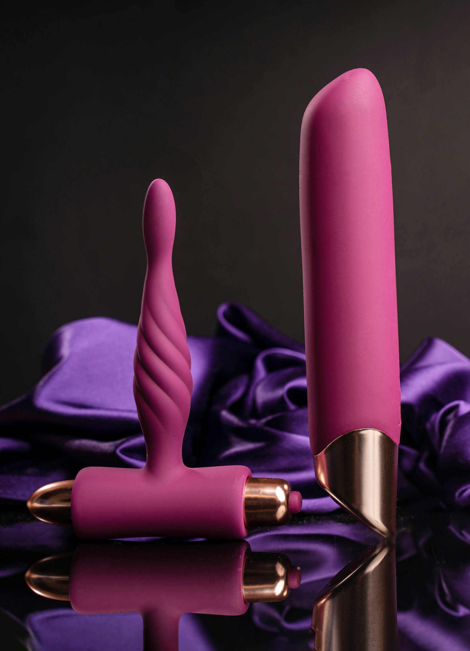 Burgundy super slim butt plug and powerful vibrator set.