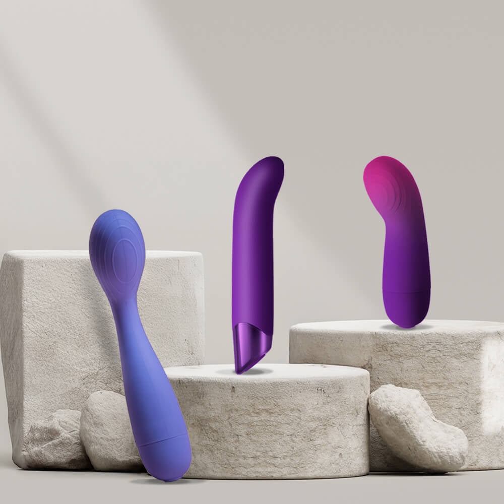 Collection of g-spot vibrators a stone podium various sizes and colours