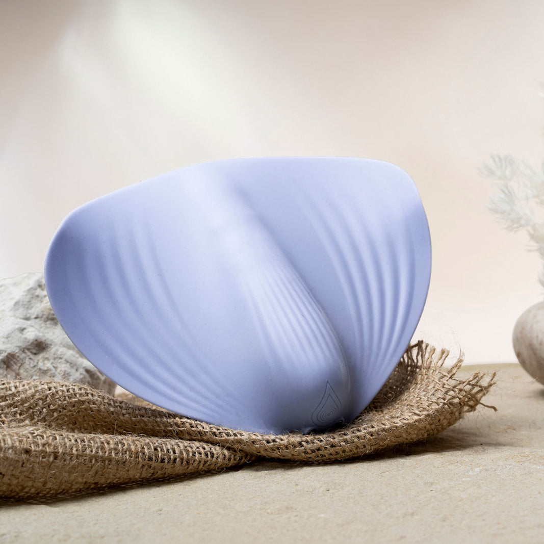 Baby blue silicone sit on vibrator and masturbator in one.