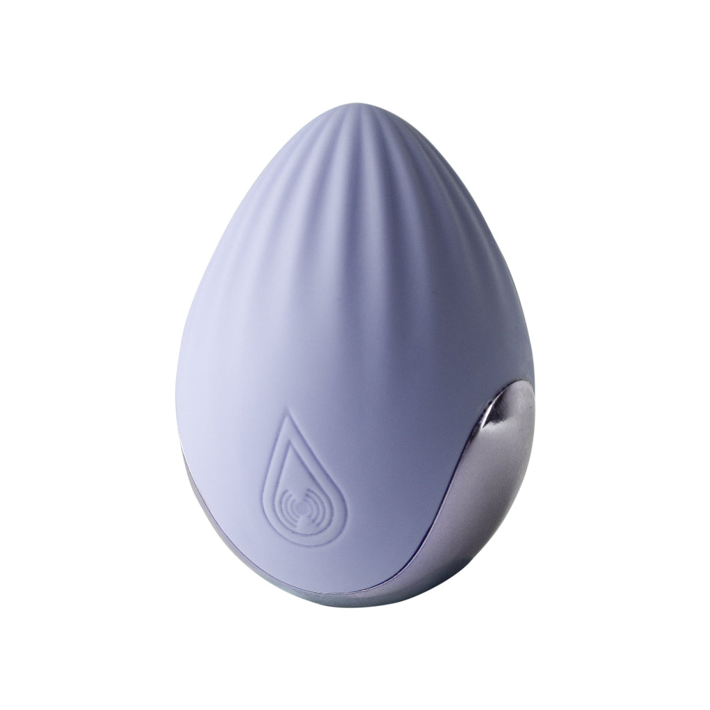 A light lavender egg-shaped personal massager with a ribbed silicone exterior, a metallic silver accent on the side, shown against a plain white background