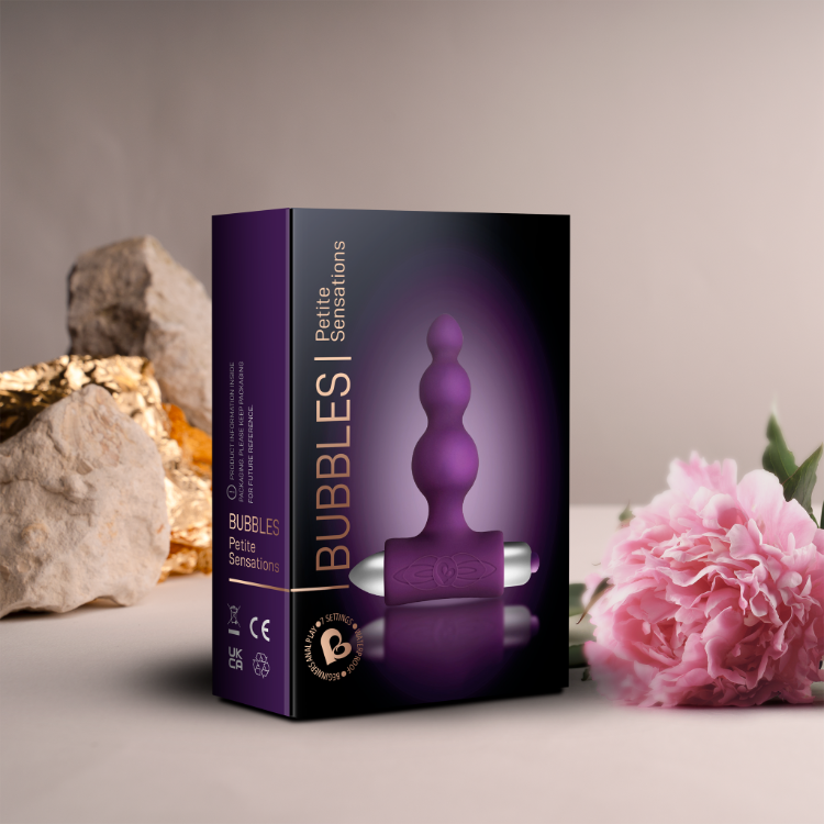 Purple vibrating anal beads in retail box with silicone beads and metal base