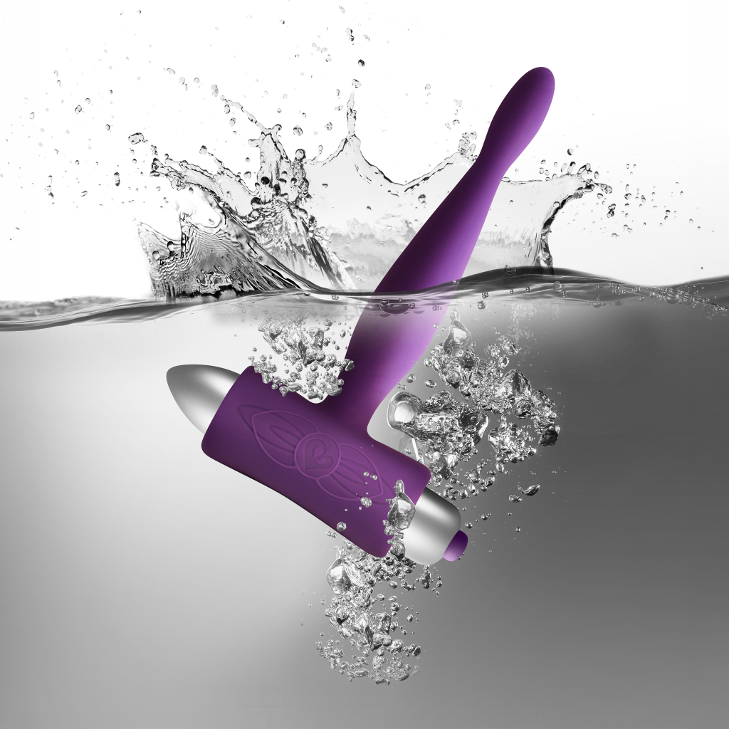 Purple vibrating anal stimulator with rounded base and tapered probe tip