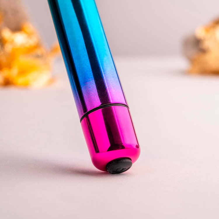 Rainbow bullet vibrator with pink base ring and small flat end cap