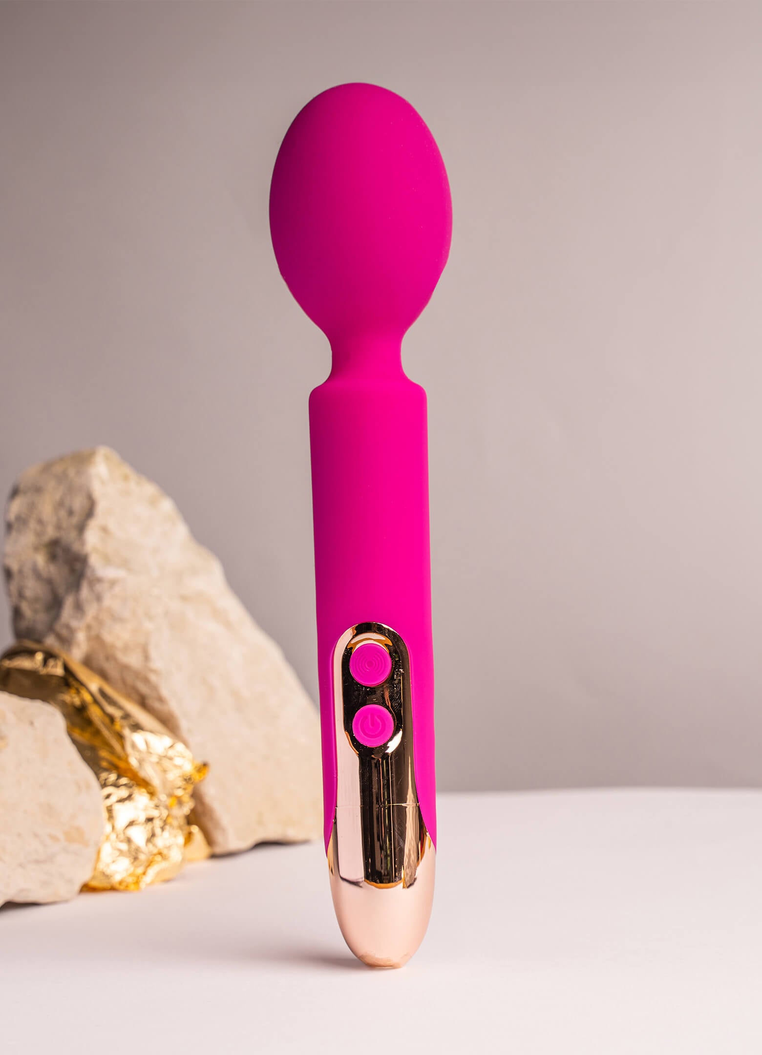 Silicone wand vibrator in pink.