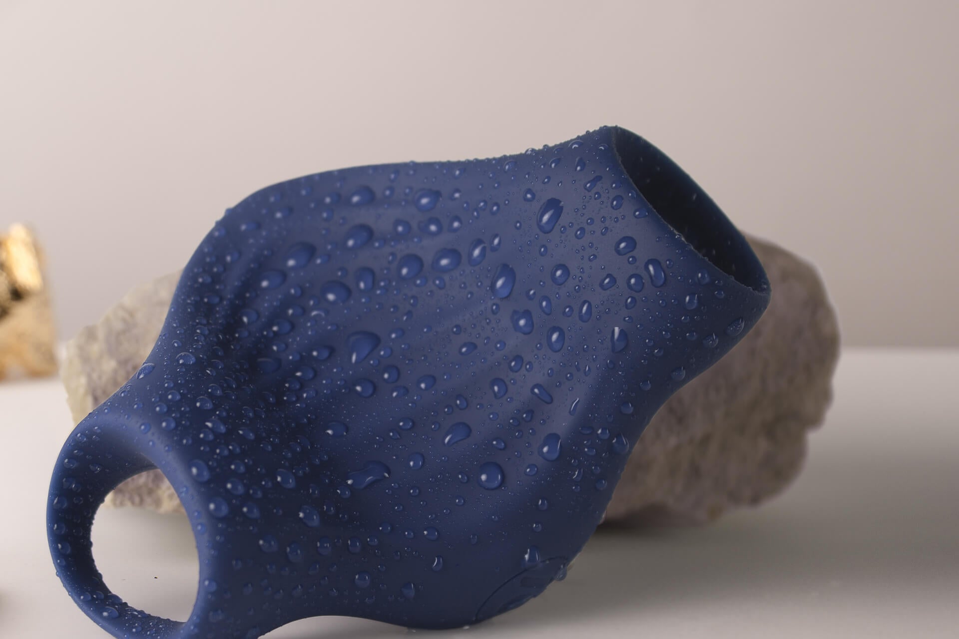 palm masturbator with water droplets