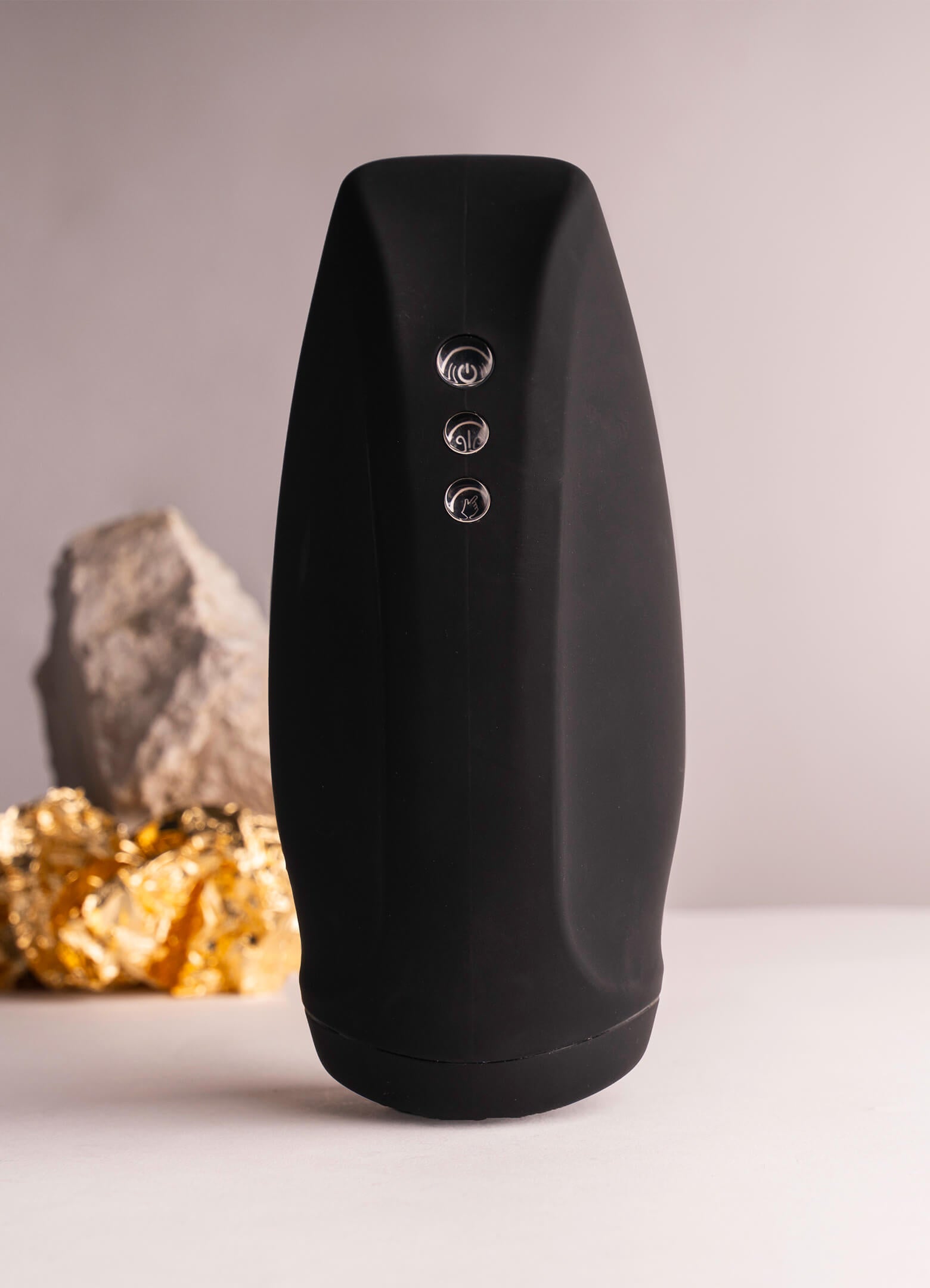 Black canned masturbator with three button functions.