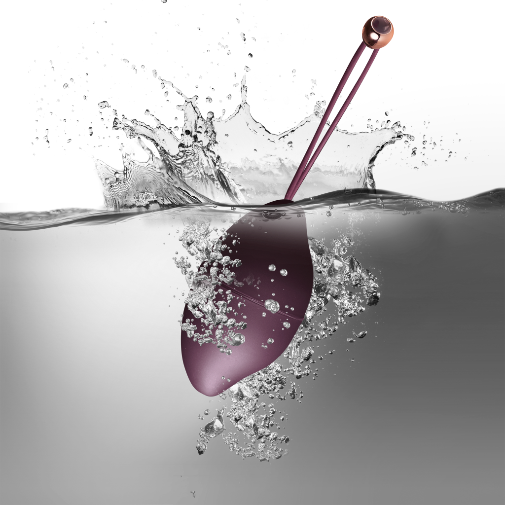 Ro-Duet two-piece intimate massager with purple and bronze ovals and connected cable