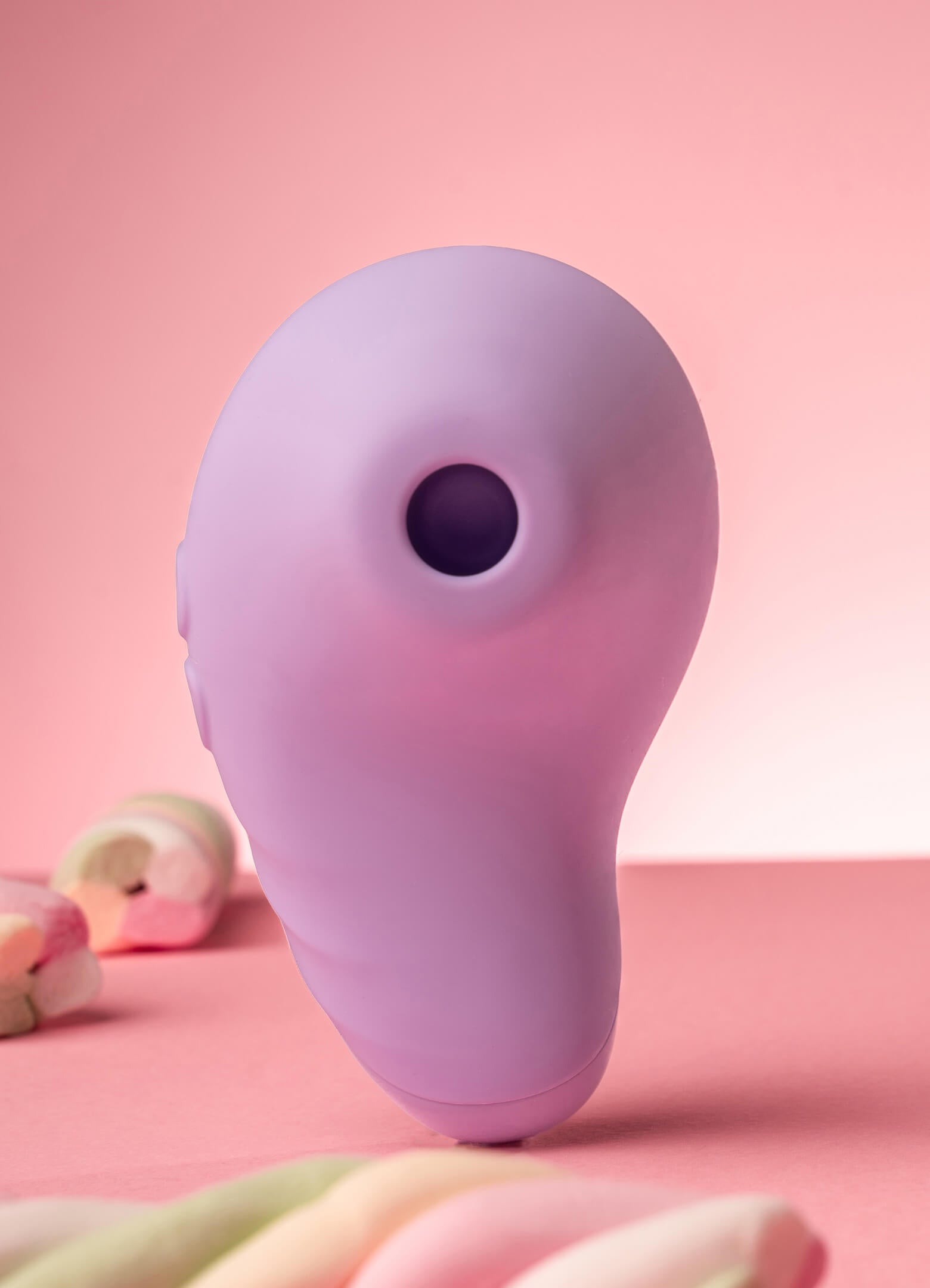 Silicone clit suction vibrating toy in lilac.