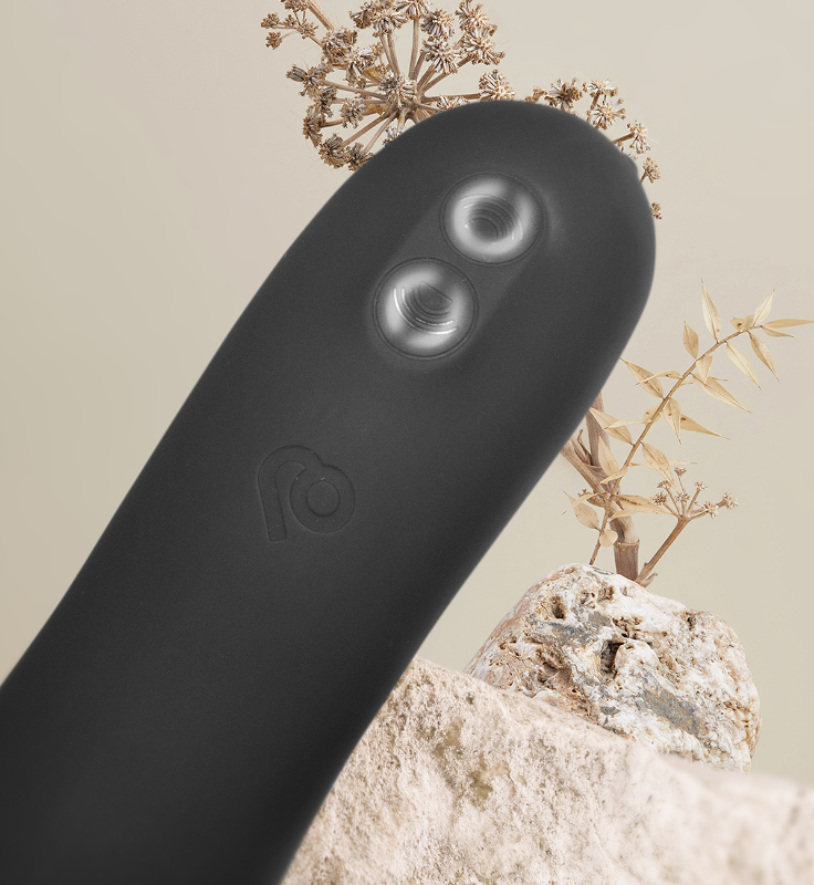 Black silicone massager head with twin motor openings and smooth U-curve