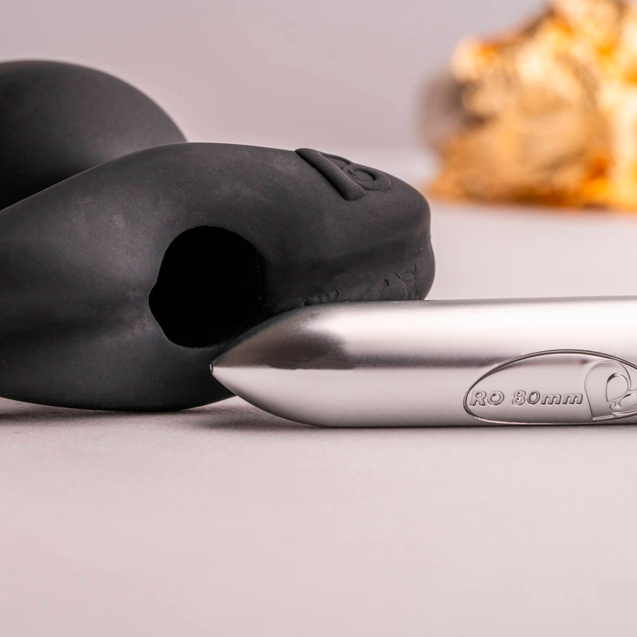Rocks Off Butt Quiver - Black Butt Plug With Bullet Vibe - close up of silicone body and RO-80 bullet vibrator that powers it