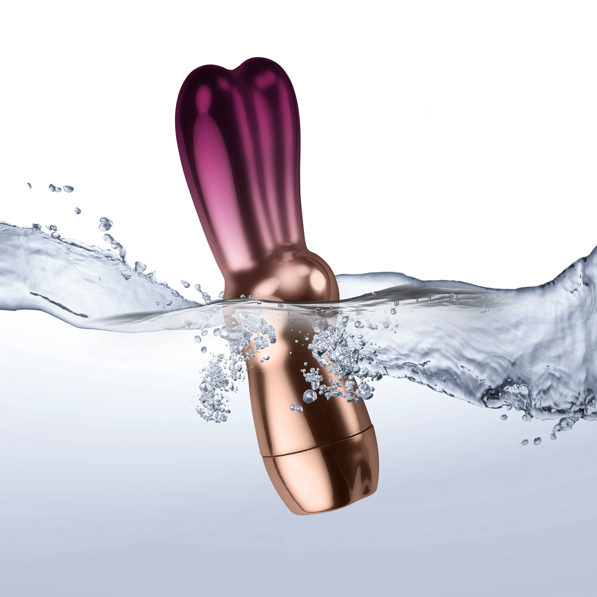 Glossy rabbit-shaped massager with purple head and rose-gold body, water splash