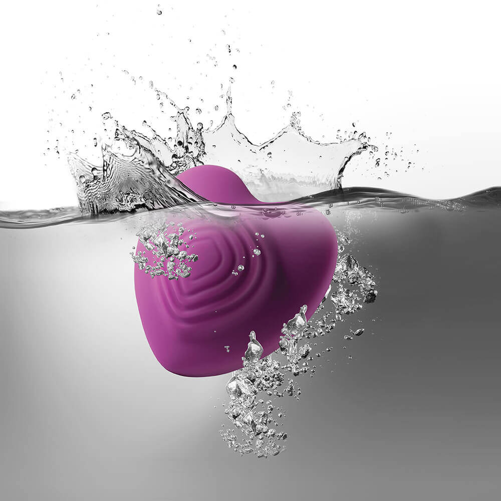 Discreet Massager half submerged in water