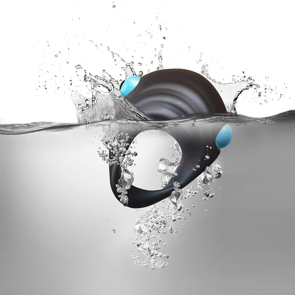 Vibrating  Cock Ring half submerged in water