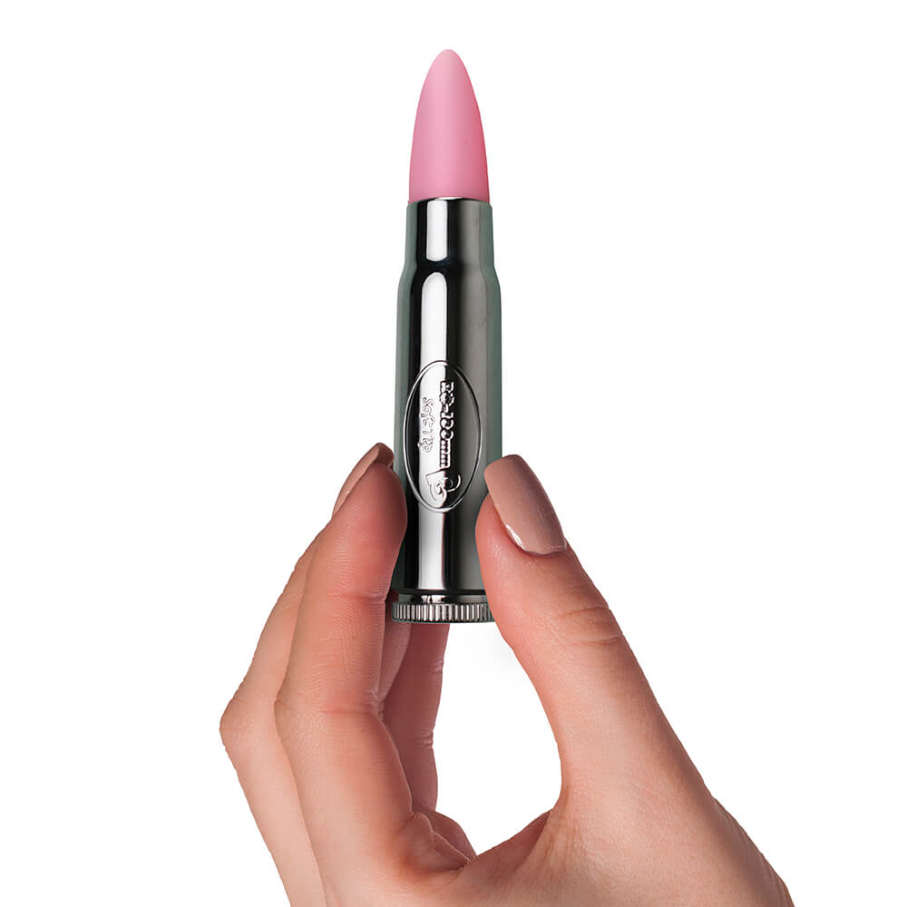 Silver soft tip Bullet Vibrator with pink tip hand scale comparison