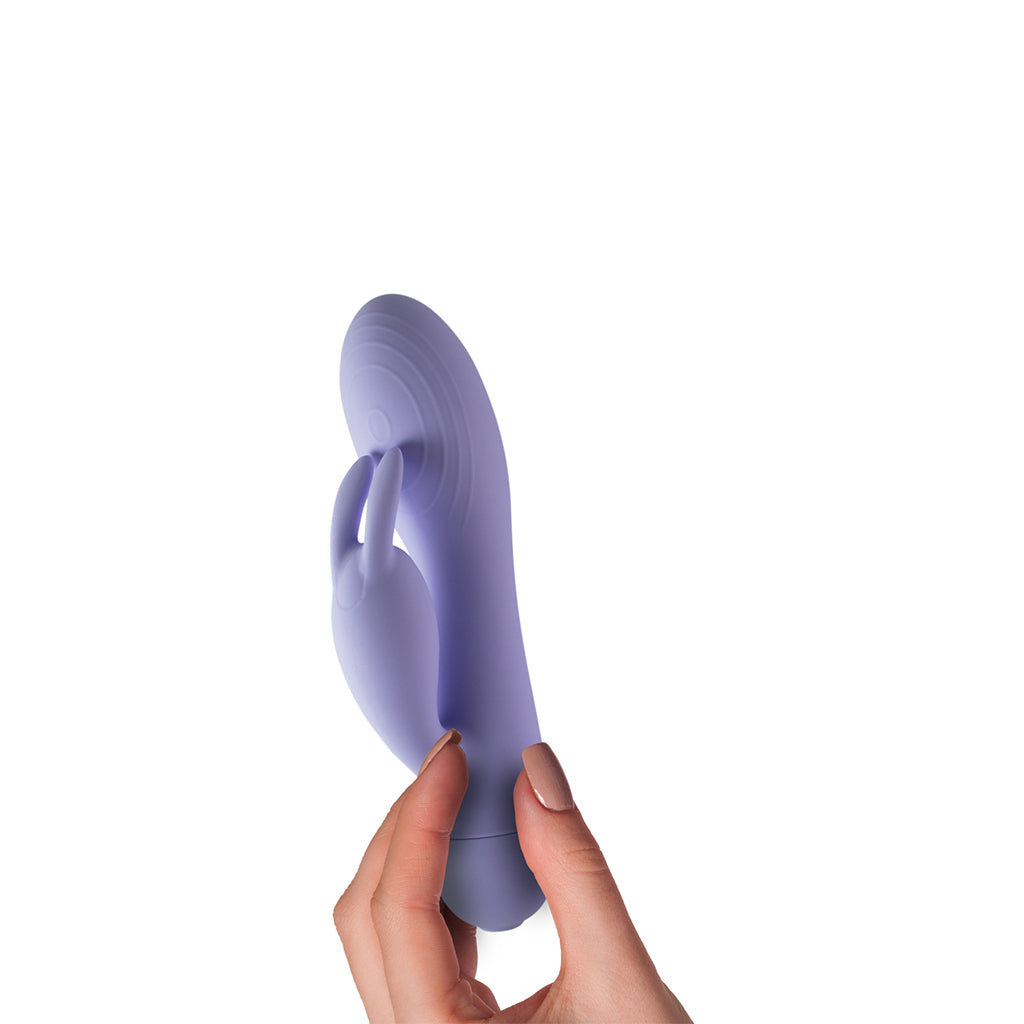 Sugar Boo Blissful Boo rabbit vibrator, held in hand to show size and scale