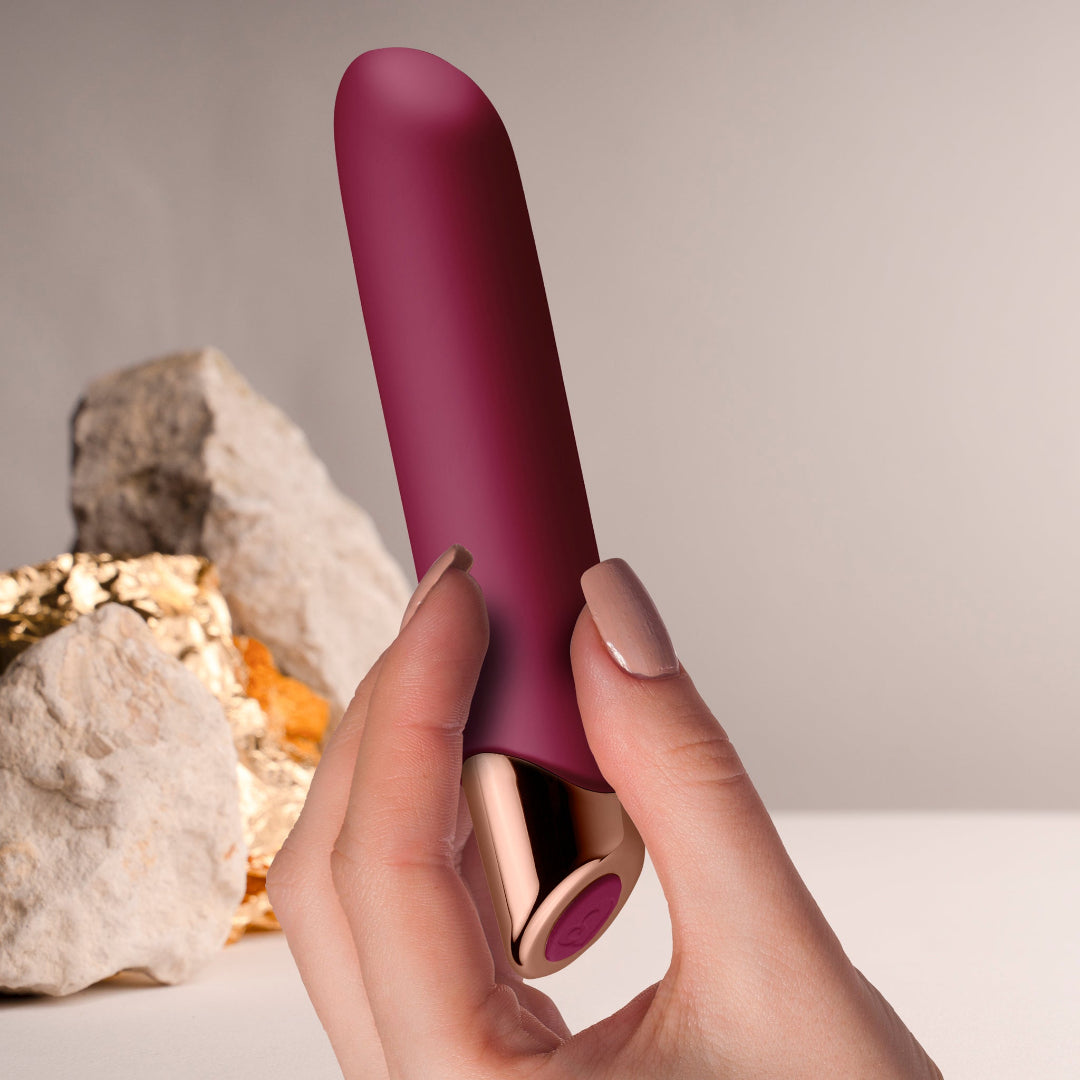 Rocks Off Chaiamo - Classic Powerful Vibrator - Burgundy in hand for scale