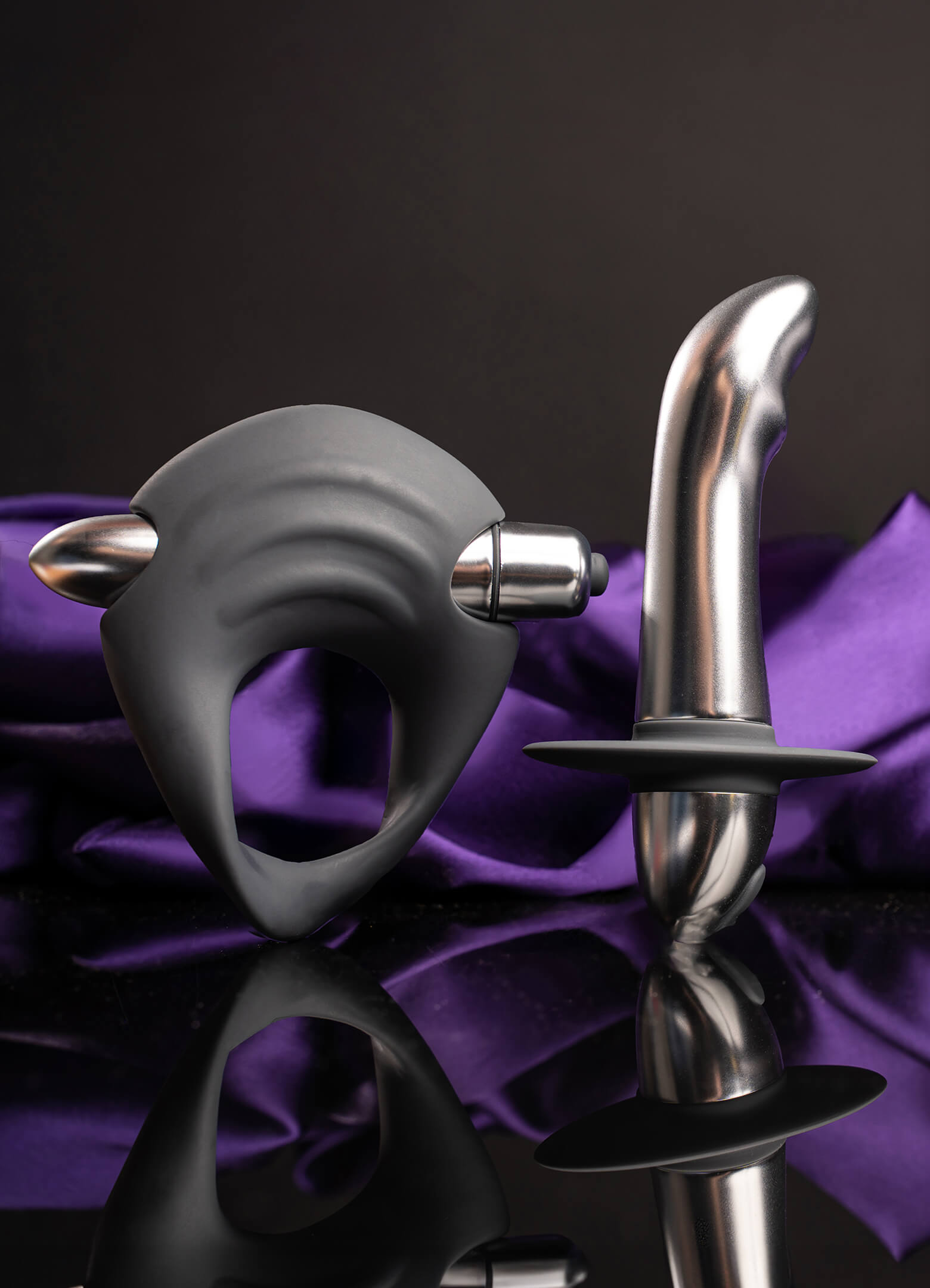 Grey cock ring with ripples and chrome prostate vibrator set.