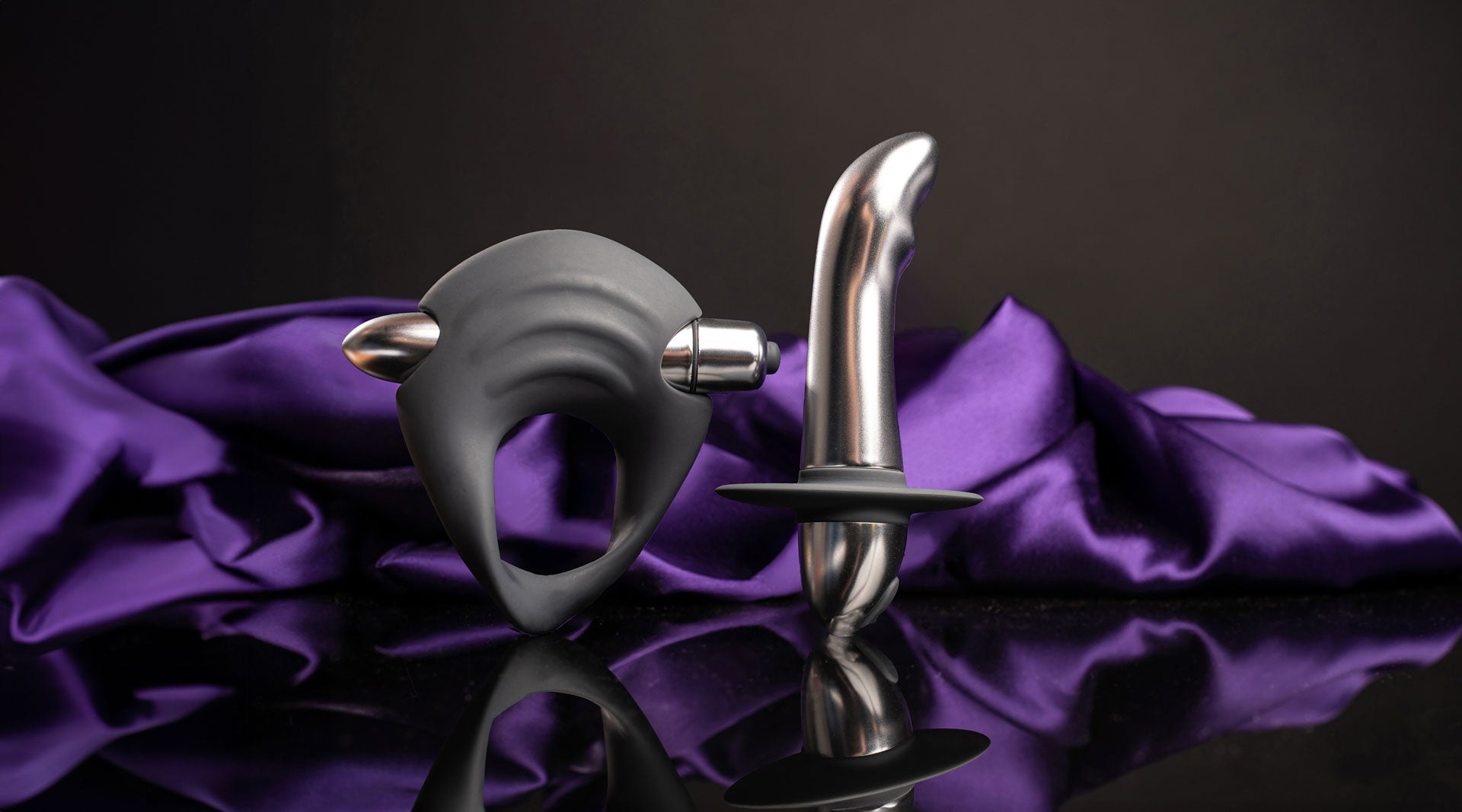 Grey cock ring with ripples and chrome prostate vibrator set.