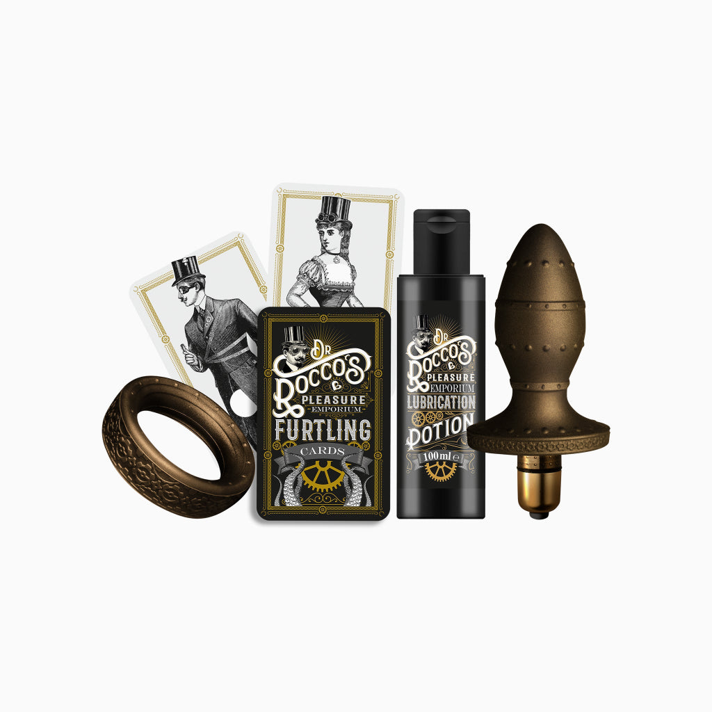 Cock ring, butt plug, lubricant bottle, and card deck gift set