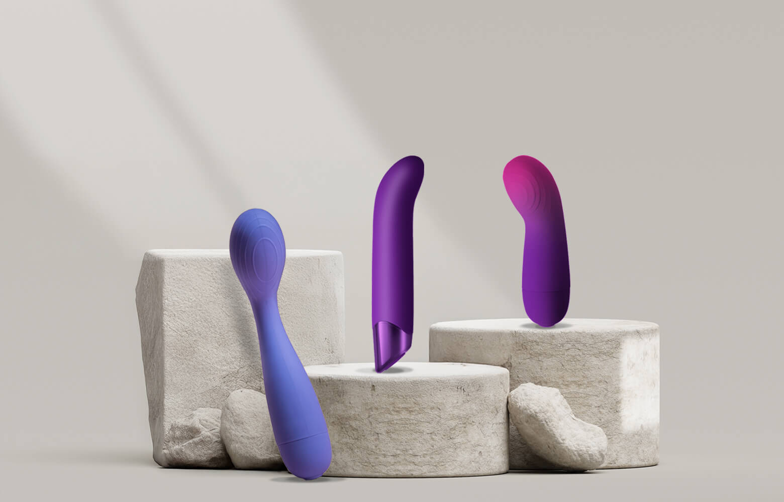 Collection of g-spot vibrators a stone podium various sizes and colours