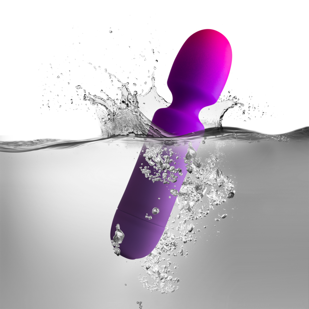 Purple waterproof wand with rounded bulb head, splash droplets around it