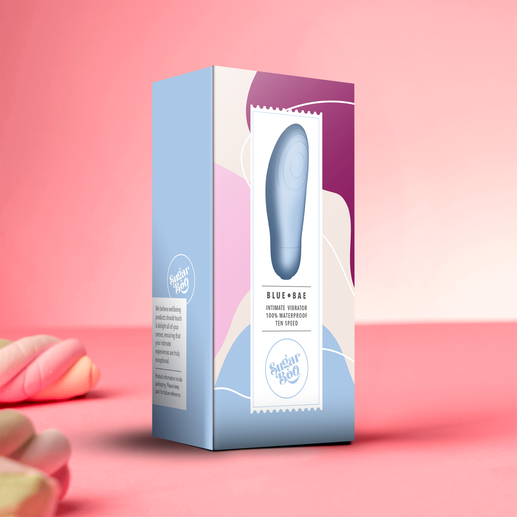 Product packaging with a pink and blue design on a pink background