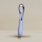 Blue and silver Niya Finger Vibe on a beige background