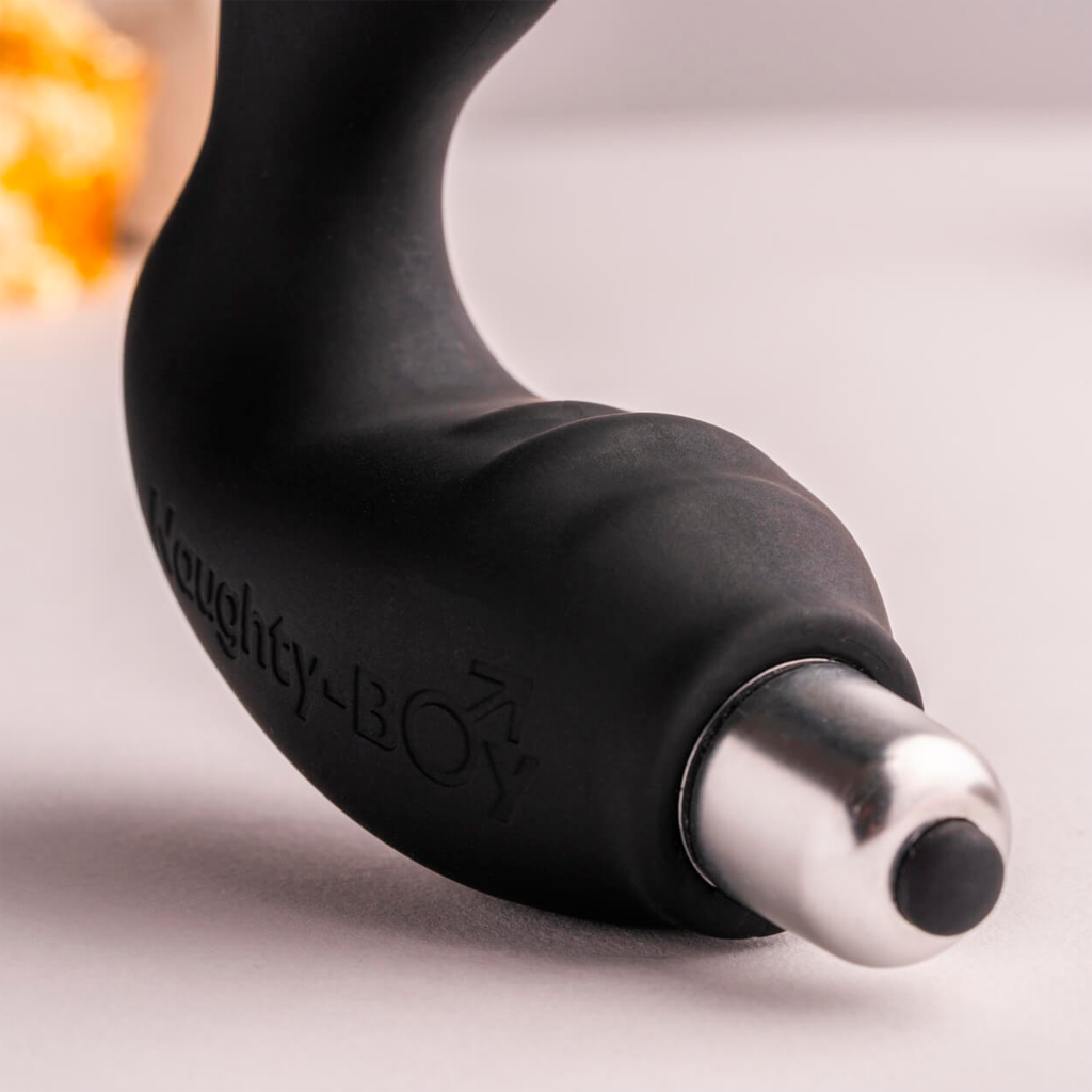 Naughty-Boy black silicone butt plug with curved shape and silver rounded tip