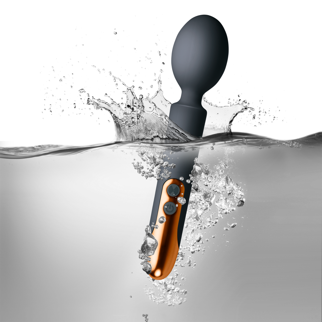 Black rechargeable wand with orange handle buttons; splash water around the head