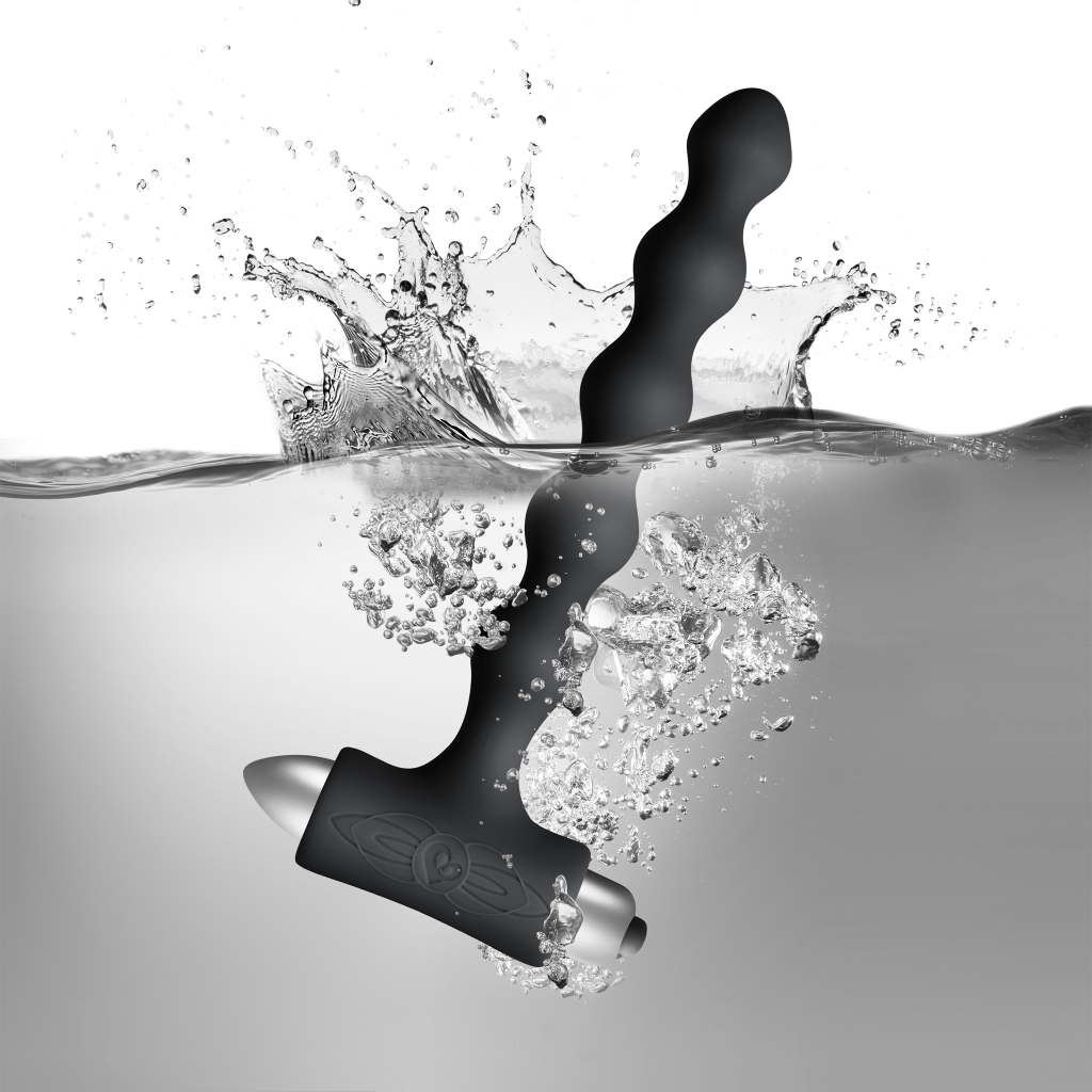 Black vibrating anal toy with water splash effect