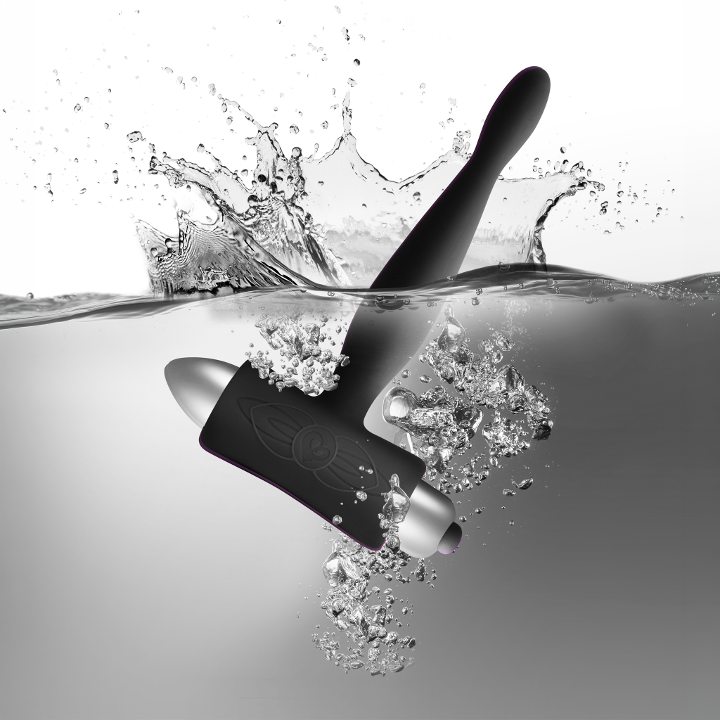 Black vibrating anal stimulator with rounded base and tapered probe tip