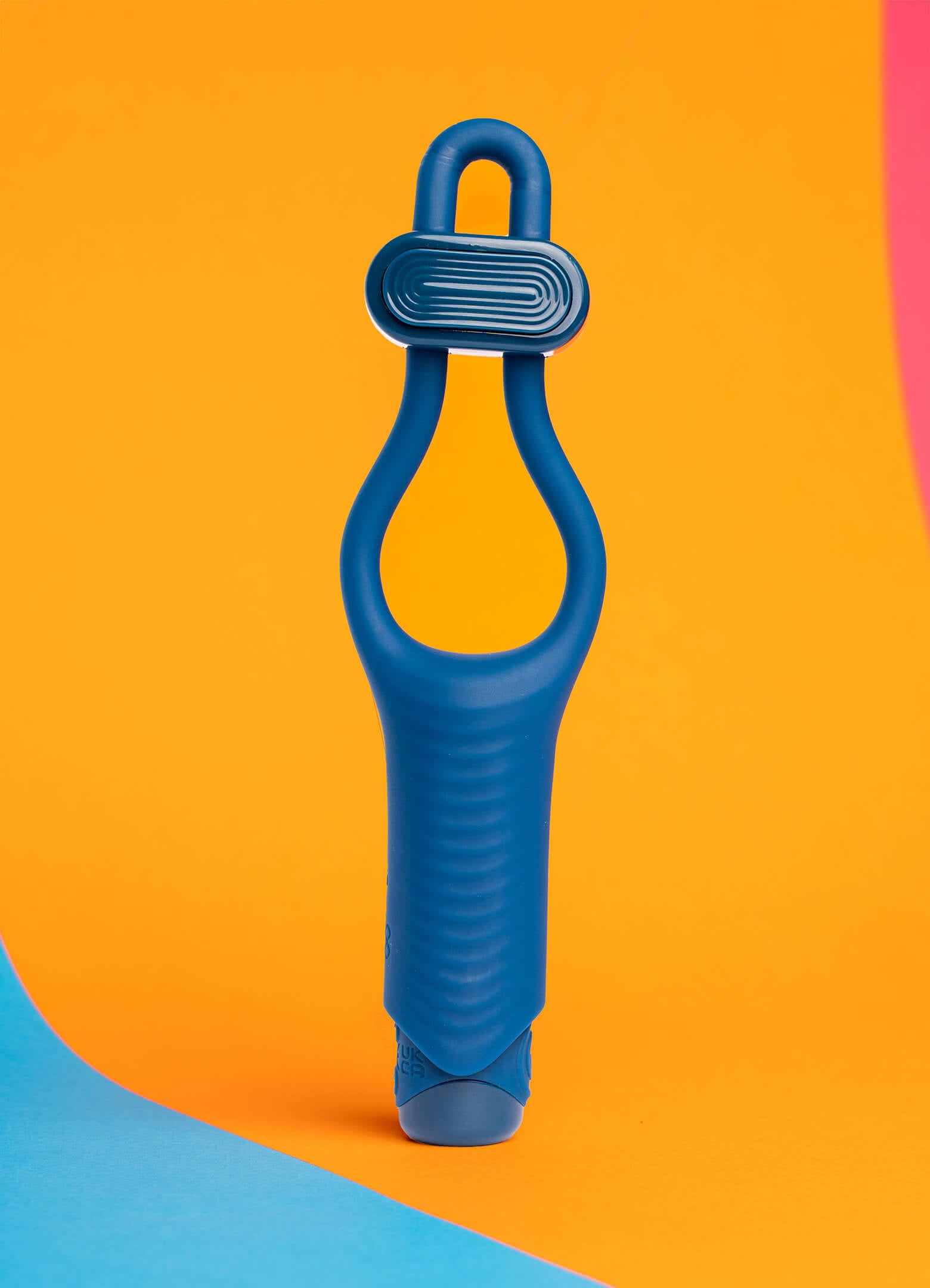 Silicone cock ring in blue with an accessible toggle button housing a removable bullet vibrator.