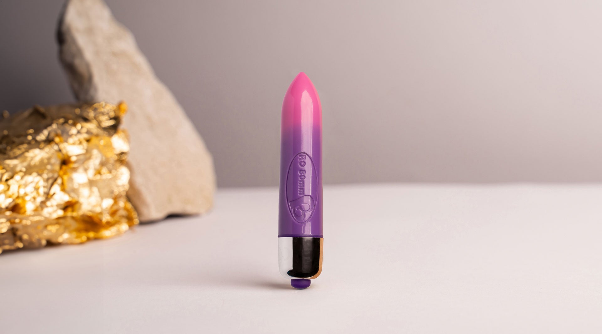 Small bullet vibrator in colour changing pink and purple.