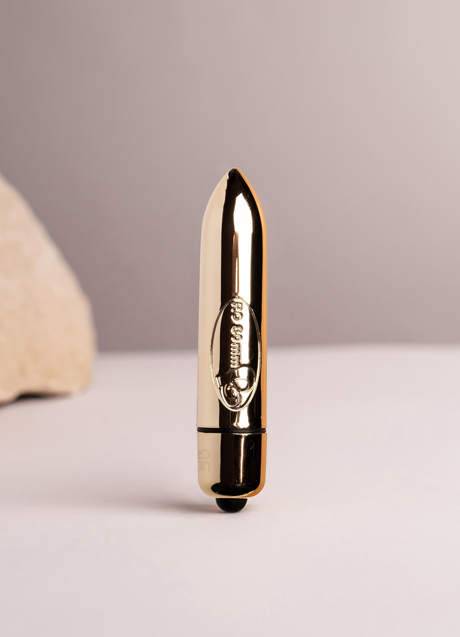 Small bullet vibrator in gold chrome.