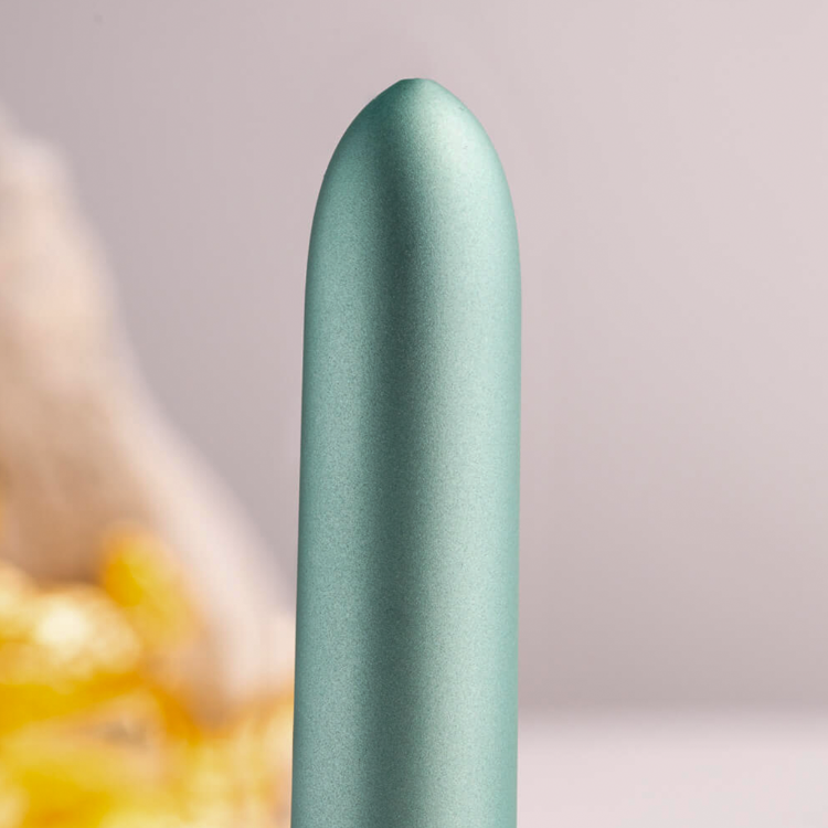 Teal bullet vibrator, smooth tapered body with rounded tip