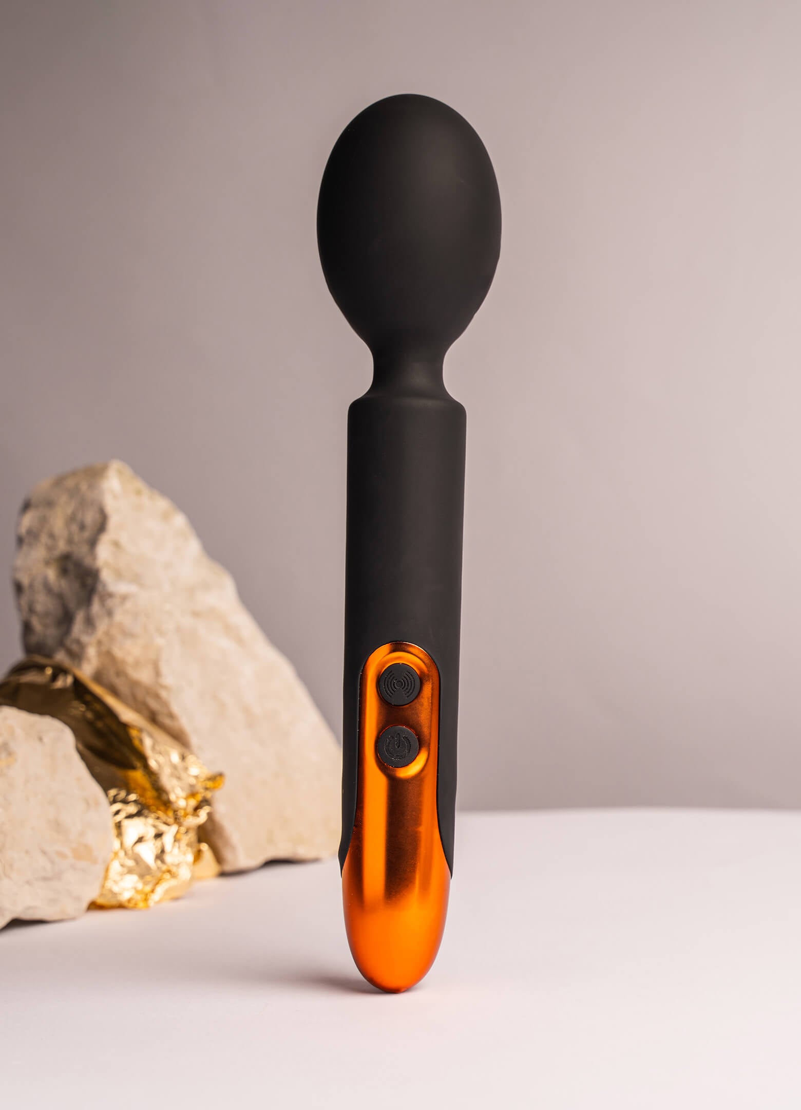 Silicone wand vibrator in black and copper.