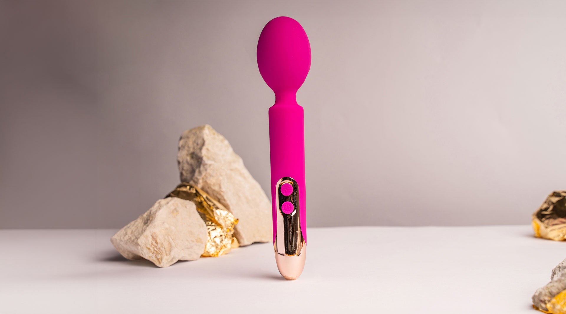 Silicone wand vibrator in pink.