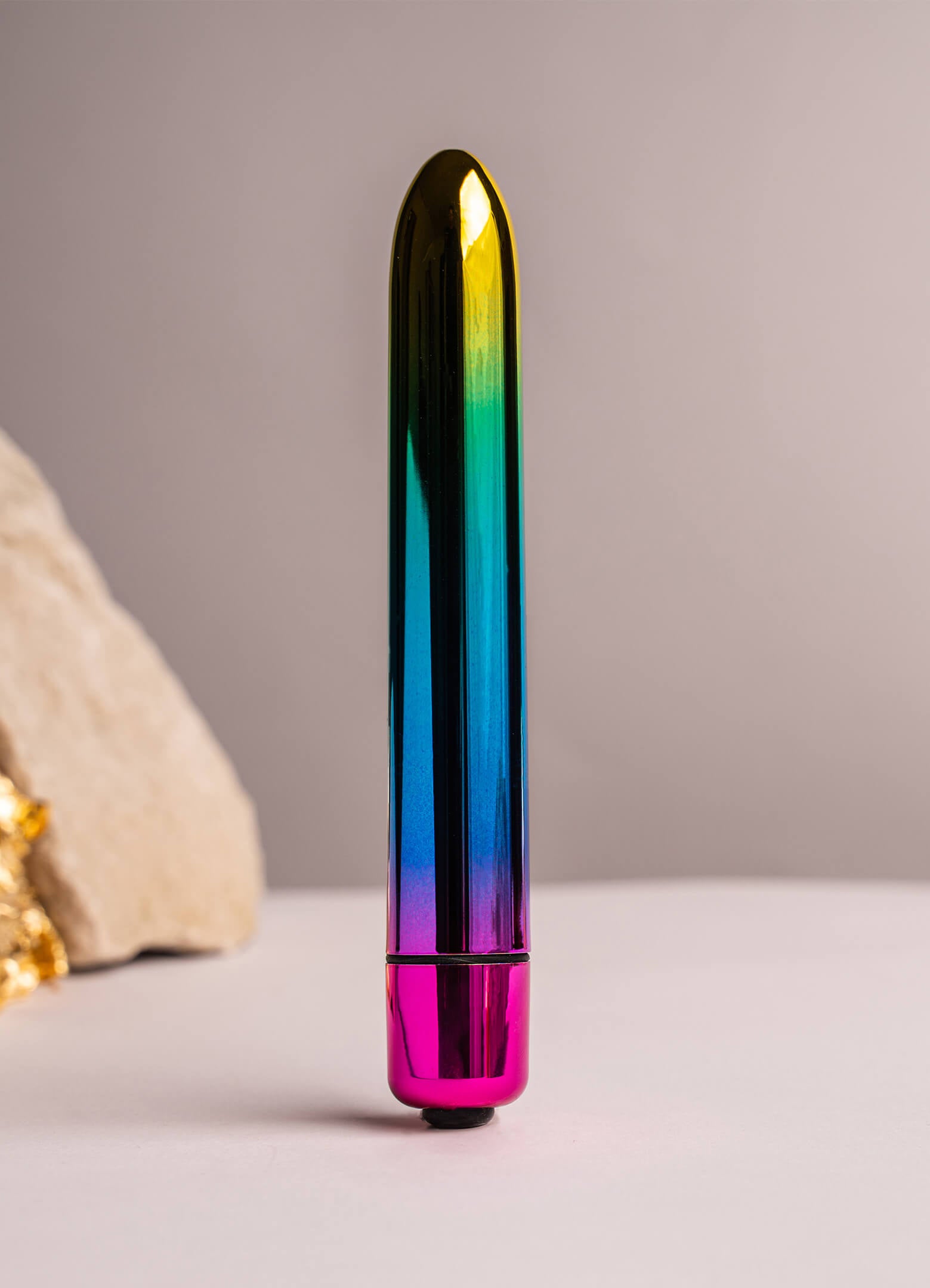 Medium sized insertable bullet vibrator in rainbow chrome colour.