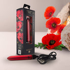 Mini bullet sex toy resting next to plain discreet UK delivery box for size reference
