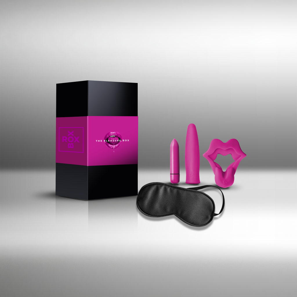 Pleasure toy set with black eye mask and three pink sex toys, boxed