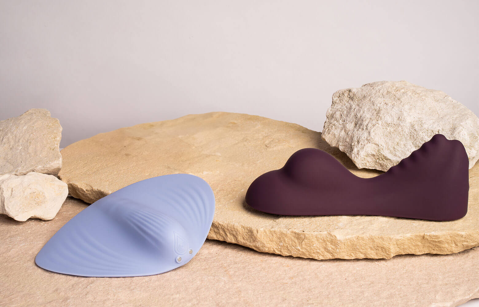 sit on vibrators arranged on natural rock surfaces