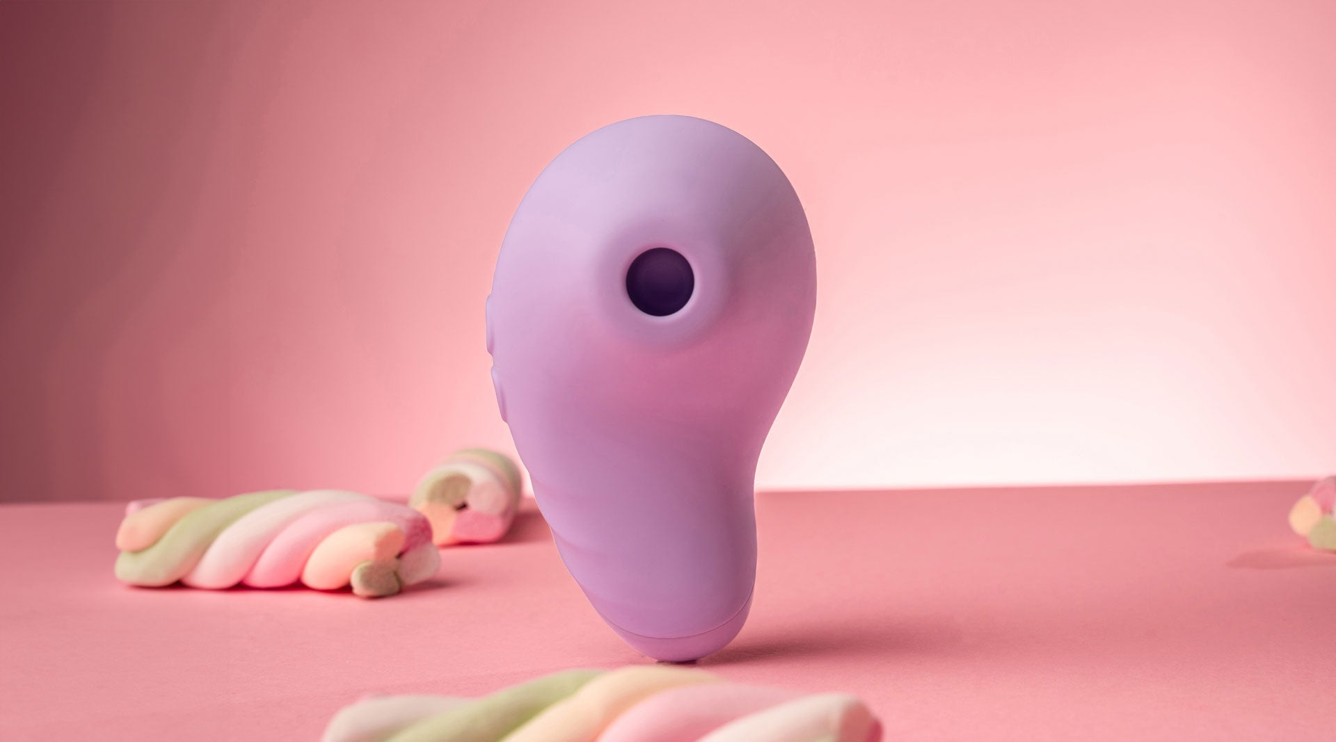 Silicone clit suction vibrating toy in lilac.