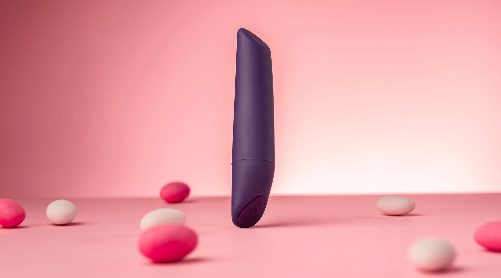 Purple vibrator with a chiseled and flat tip.