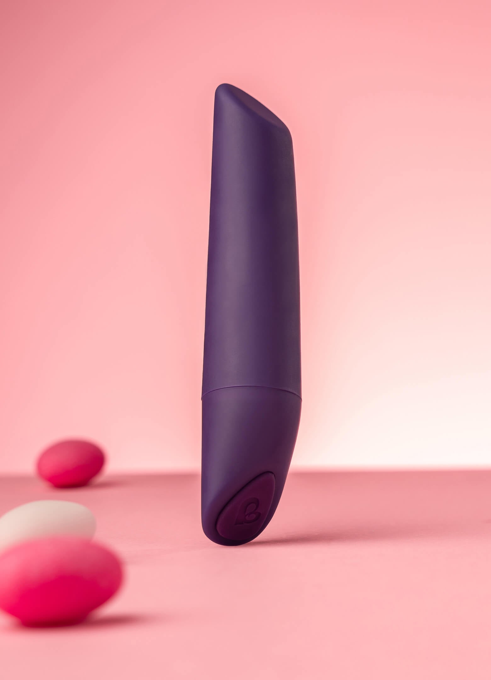 Purple vibrator with a chiseled and flat tip.