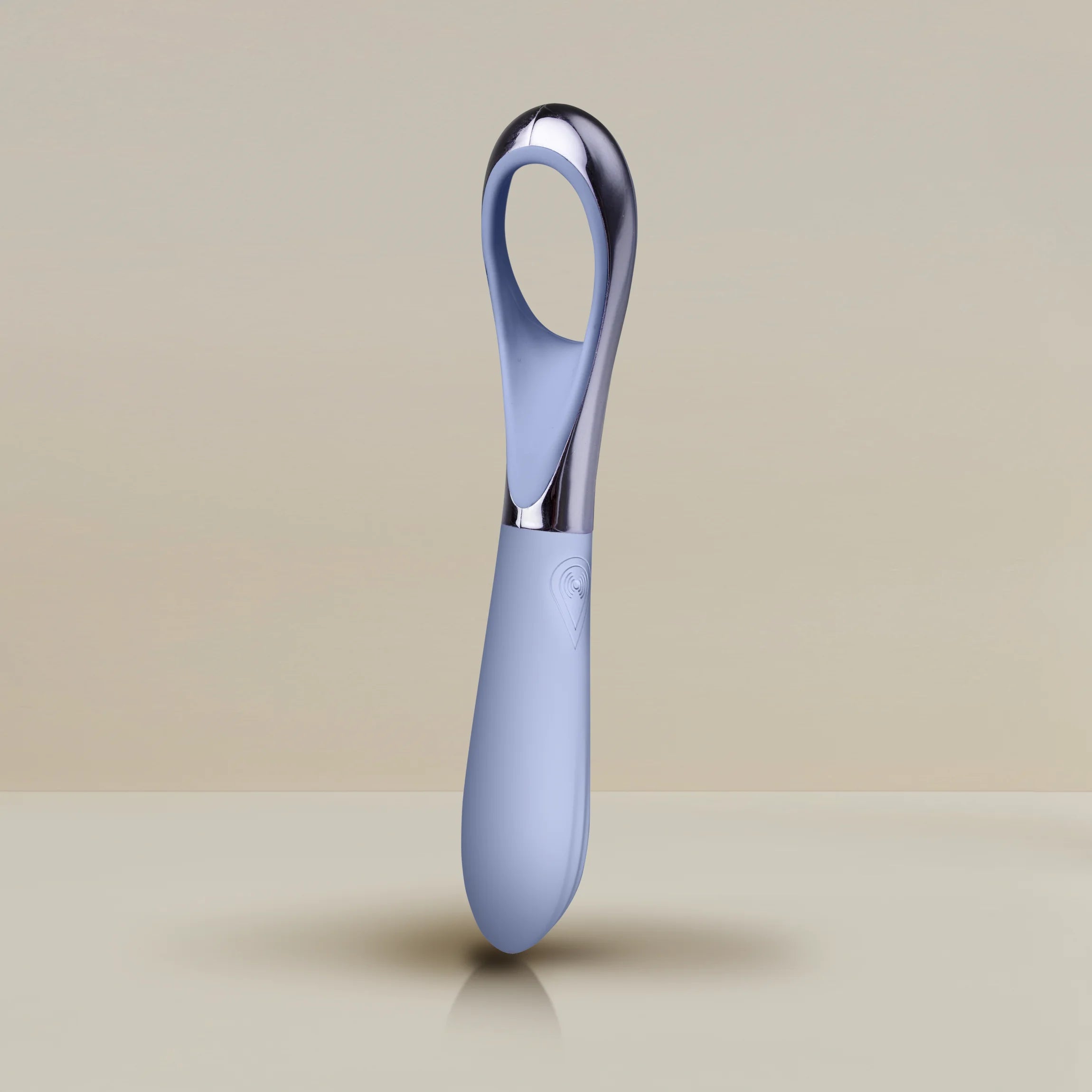 NIYA N3 facial wand standing upright, light blue glossy finish with loop handle