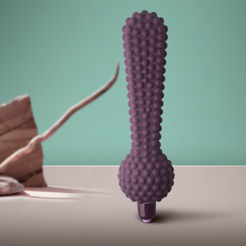 Purple bumpy silicone massager with rounded tip and flared base
