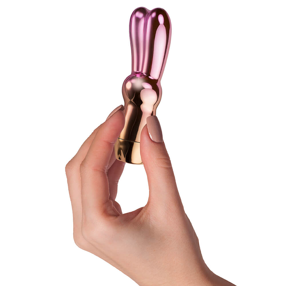 Little charm vibrator product hand scale